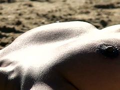 nude yoga on a beach