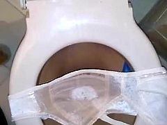 piss bra in the toilet