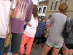 Cute girls' feet at street festival