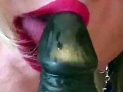 Licking black dildo