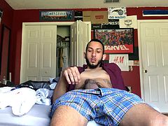 Suddenly, a big cock pops out the fly of his boxers, and he starts stroking, while occasionally glancing at the porn playing on his laptop. With boxers pushed down just enough to free cock and balls, Brian beats his meat in earnest and soon enjoys the climax hes been chasing. We leave this horny boy, with cum dripping down his fingers and breathing heavy.