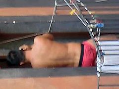 hot guy in balcony in briefs