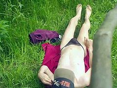 laying in the grass