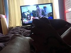 Hand job watching porn