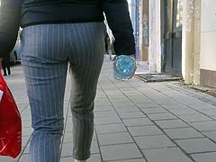 Nice ass is walking down the street