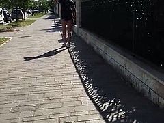 following a sweet girl in the street (slowmo, not nude)