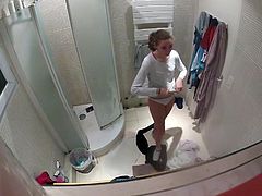 voyeur teen in bathroom shower 1 of 4