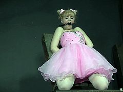 Lovely babe looking like a doll gets her pussy fucked and punished in the dark room