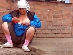 Russian granny shows her tits off