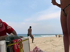 Beach slut with inverted g-string bikini