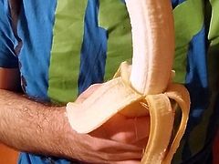 Sucking on a banana