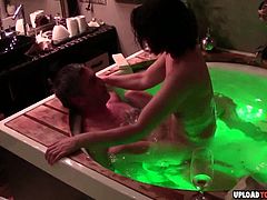 Lucky guy gets to plow his wife in a glowing hot tub in various positions.