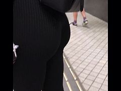 Ass in tight black leggings