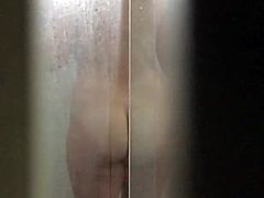 Spy Cam- showering wife with big tits and hairy pussy