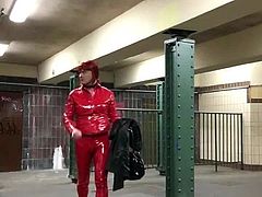 Cruising at trainstation in red pvc suit