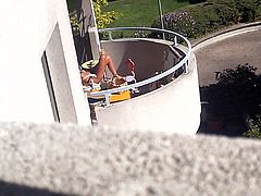 Spy candid neighbour on balcony