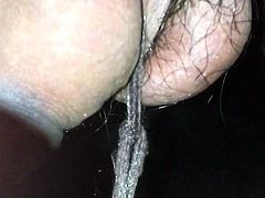 2.5L bottle hanging from cock and balls