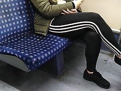 Chav on a train to Cambridge (addias bottoms)