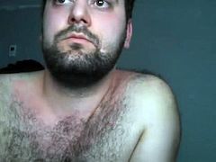 Horny bear jerks his dick off