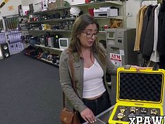 Hottie drives a hard bargain and fucks in the pawnshop