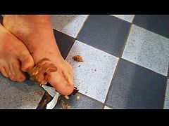 Male feet crushing food