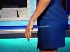 Sexy Quiz host in show stockings top