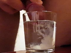 Cum into a glass of water