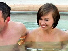 Couples surround each other at hot tub