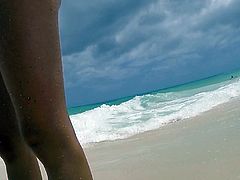 Nudist milf walking on the beach of Fuerteventura