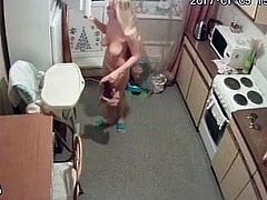 Hidden camera of two sisters, the eldest in the kitchen