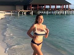 Bouncing Big Teen Tits while Running on the Beach