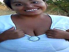 Check out this smoking hot and horny amateur ebony chick wearing sexy white top and showing off her big natural juicy tits.Watch in HD.