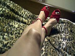 laying down whit red heels