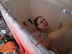 Mom can't help herself in the shower, and uses a dildo to ma