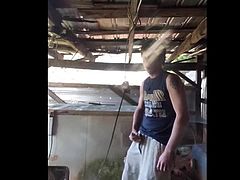 Twink wanking off in the shed