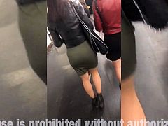 Two girls in very short mini skirts in the metro