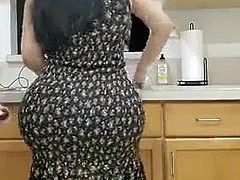 Big ass and tits get fucked in the kitchen by huge cock
