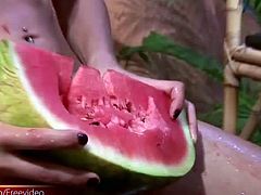 This cute T-girl loves fresh fruit and is so happy that its watermelon season. She cuts a piece of thick watermelon she puts her shecock against it and starts to feel how good the texture is ...