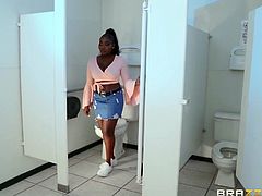 She found something amazing when she went to the rest stop. The bathroom has a gloryhole and there’s a big white cock waiting for her. This ebony babe has no problem cheating on her husband with the anonymous guy.