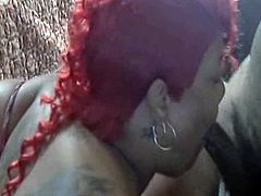 sexy black bbw Ms Redd sucking dick while looking sexy with her new red hair doo, so sexy guy can't even hold himself together while she is giving him some sloppy top, do check this clip out.