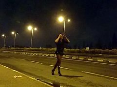 Shameless girl trying to hitchhike.