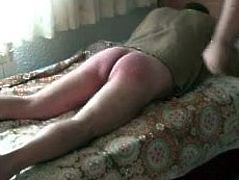 Spanking for two in the bedroom.