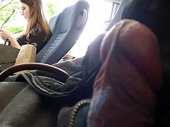 cumflash next to brunette girl in bus