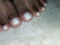 Closeup on Morenafeet's fingers with French nail polish 4