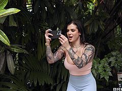 Love birds in the garden are making love, slim curvaceous beauty is on her knees sucking her man's hard black cock. She positions herself to get her pussy pumped doggy style. Tattooed peeker entices the man to follow her, she sucks his dick and makes him cum again.