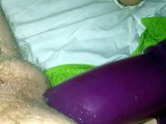 Purple dildo in a little action