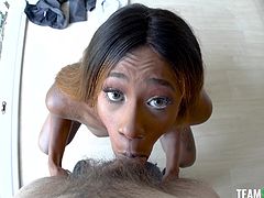 Ebony babe undresses in the lust of a big white cock. Nasty girl shows her big tits and puts a big dick into her mouth and sucks the tip of it only in the beginning, but as she maintains speed, she starts sucking it to the shaft and does not stop until she gets hot cum for drinking in her mouth.