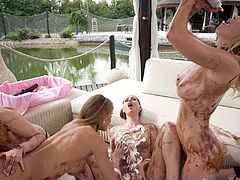 These kinky lesbian babes came on an office lunch with their boss, but when they were halfway through, one of the babes got horny and smeared chocolate sauce on another, which led to a nude cake fight. Eventually, they got everybody naked and started eating each other out as their boss watched them.