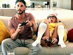 I thought that my blonde stepsister was playing video games, but she was playing with her dildo by inserting it in her wet cunt. So when I sat near her, she hid it under the blanket, but I insisted she must show me, and after knowing it, I took her tight pussy's advantage by licking and banging her wildly.